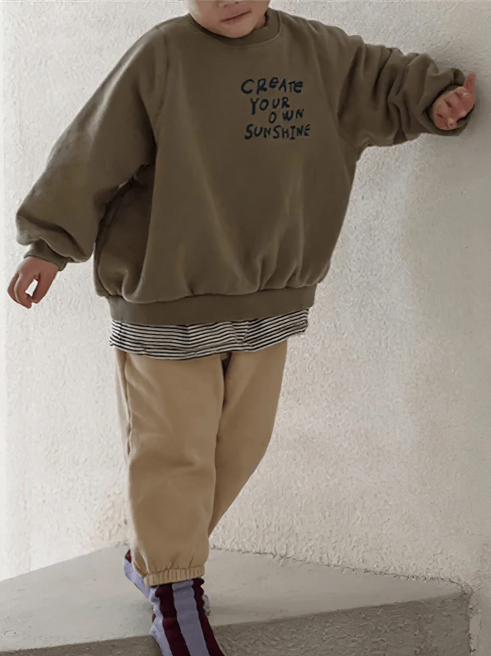 Kid wearing Long-Sleeved Sweatshirt With Letter Print - SF3555, 'Create Your Own Sunshine' fleece, cozy and stylish for casual outings.