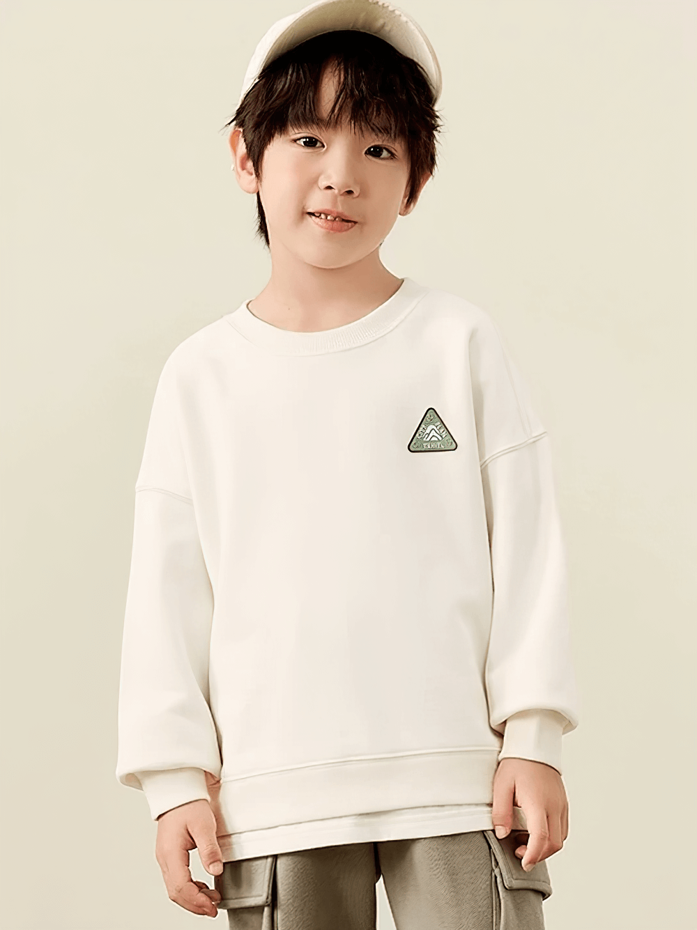 Kid wearing long-sleeved sweatshirt with mountain design, SF3095, perfect for adventurous spirits. Trendy and practical for everyday wear.