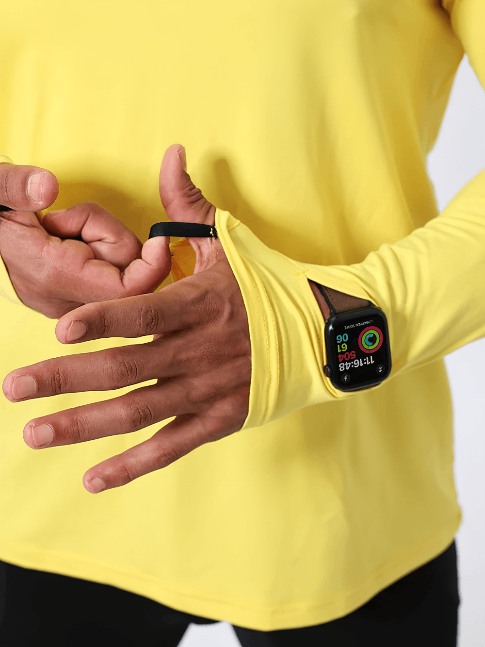 Long-Sleeved Workout Top with Watch Opening - SF4737 in vibrant yellow showcasing thumbhole sleeve detail and watch opening.