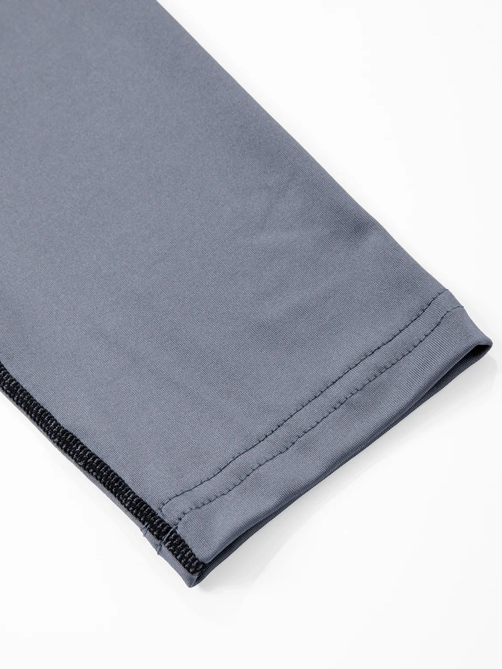Close-up of the sleeve of Long Sleeves Athletic Compression Top with Color Block - SF4588, showcasing fabric detail.