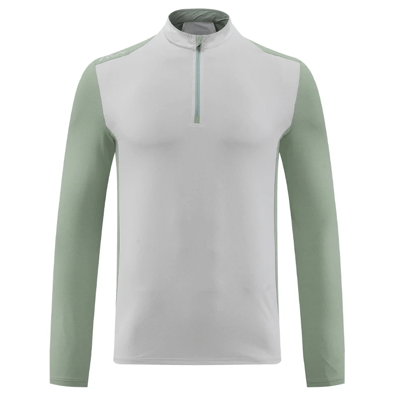 Men's long sleeve pullover with contrasting green sleeves, half-zip design for athletic performance and moisture-wicking comfort.