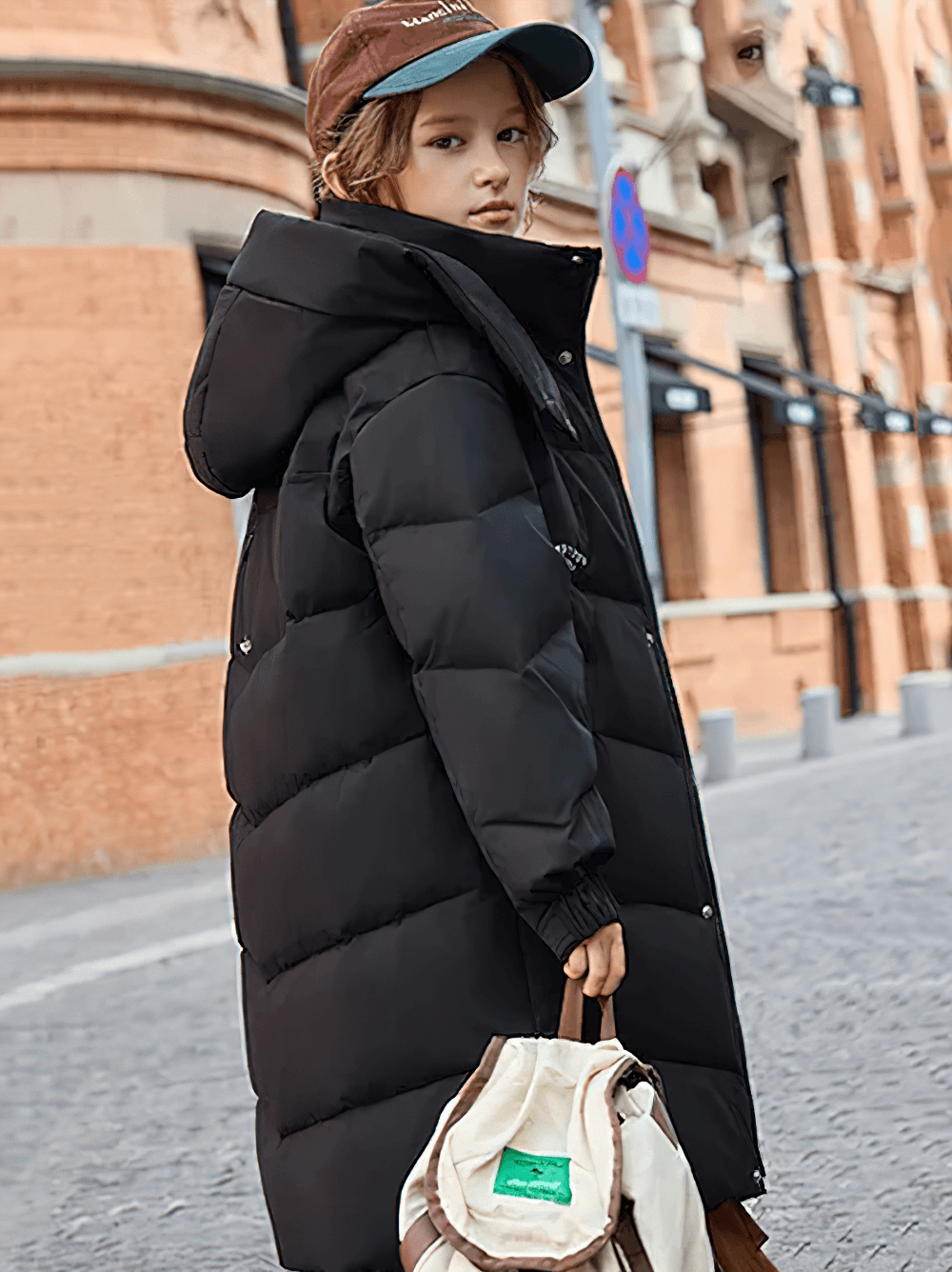 Child in a black Long White Duck Down Jacket with Hood and Zipper - SF3631 standing on city street with backpack