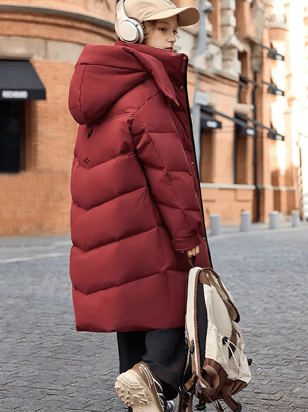 Child wearing a wine red Long White Duck Down Jacket with Hood and Zipper - SF3631 on a city street.