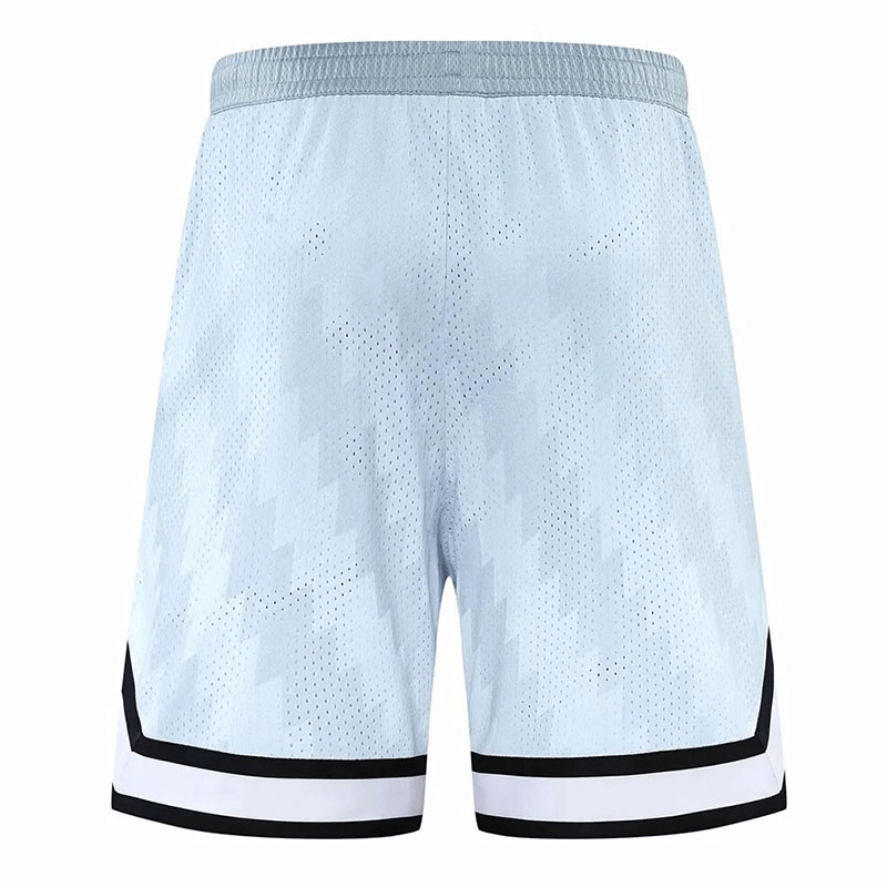 Loose breathable basketball shorts with printed design, featuring quick-dry polyester fabric and pockets for versatile sports activities.