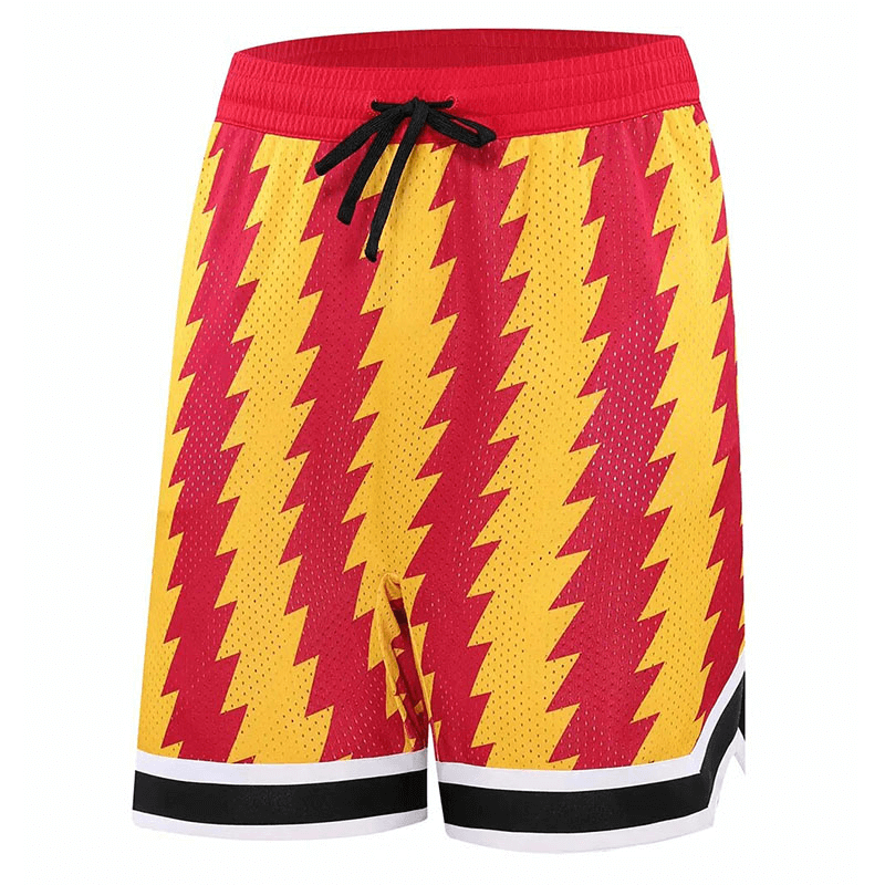 Vibrant red and yellow zigzag basketball shorts for men, featuring breathable fabric and sleek black drawstring for optimal workout comfort.