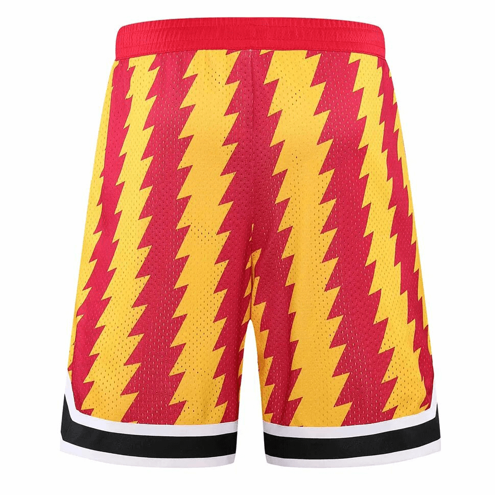 Loose breathable basketball shorts with vibrant lightning print, perfect for sports and workouts. Quick-dry, comfy, with handy pockets.