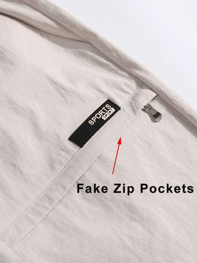 Close-up of men's calf-length shorts pocket with a label and fake zip detail, emphasizing style and design.