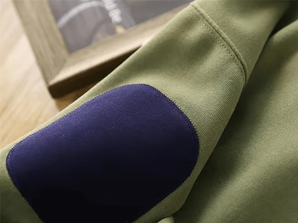 Loose Cotton Pullover with Contrast Elbow Patches, SF3104 - Stylish olive sweatshirt featuring a navy elbow patch detail for a casual chic look.