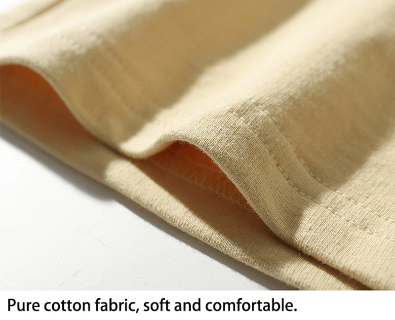 Close-up of beige cotton fabric showcasing soft and comfortable texture for men's breathable sports shorts.