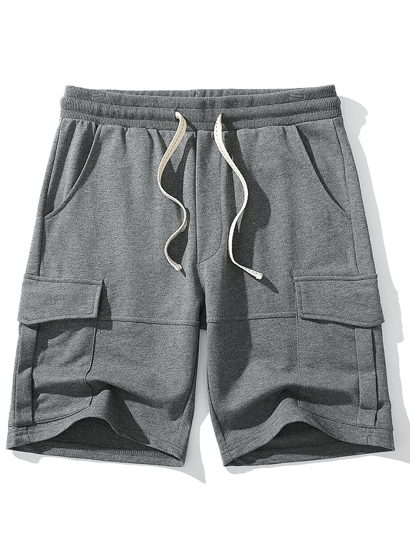 Gray breathable multi-pocket sports shorts for men with drawstring closure, ideal for gym and sports activities.