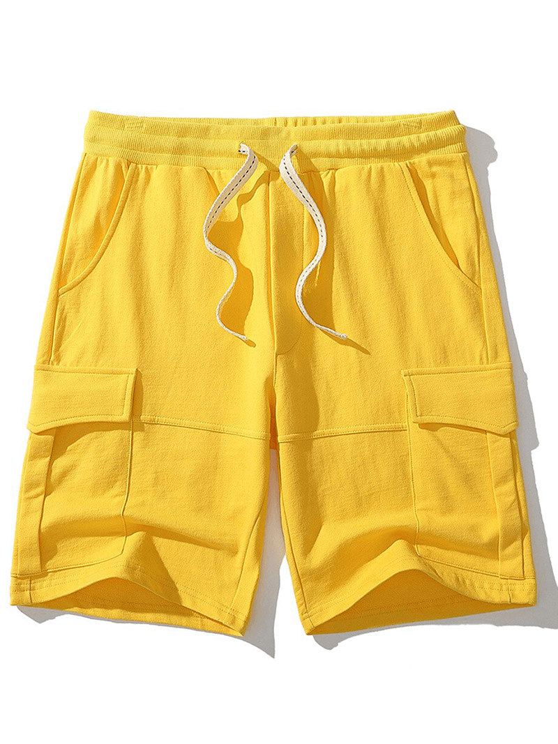 Vibrant yellow multi-pocket sports shorts for men with drawstring, ideal for gym activities.