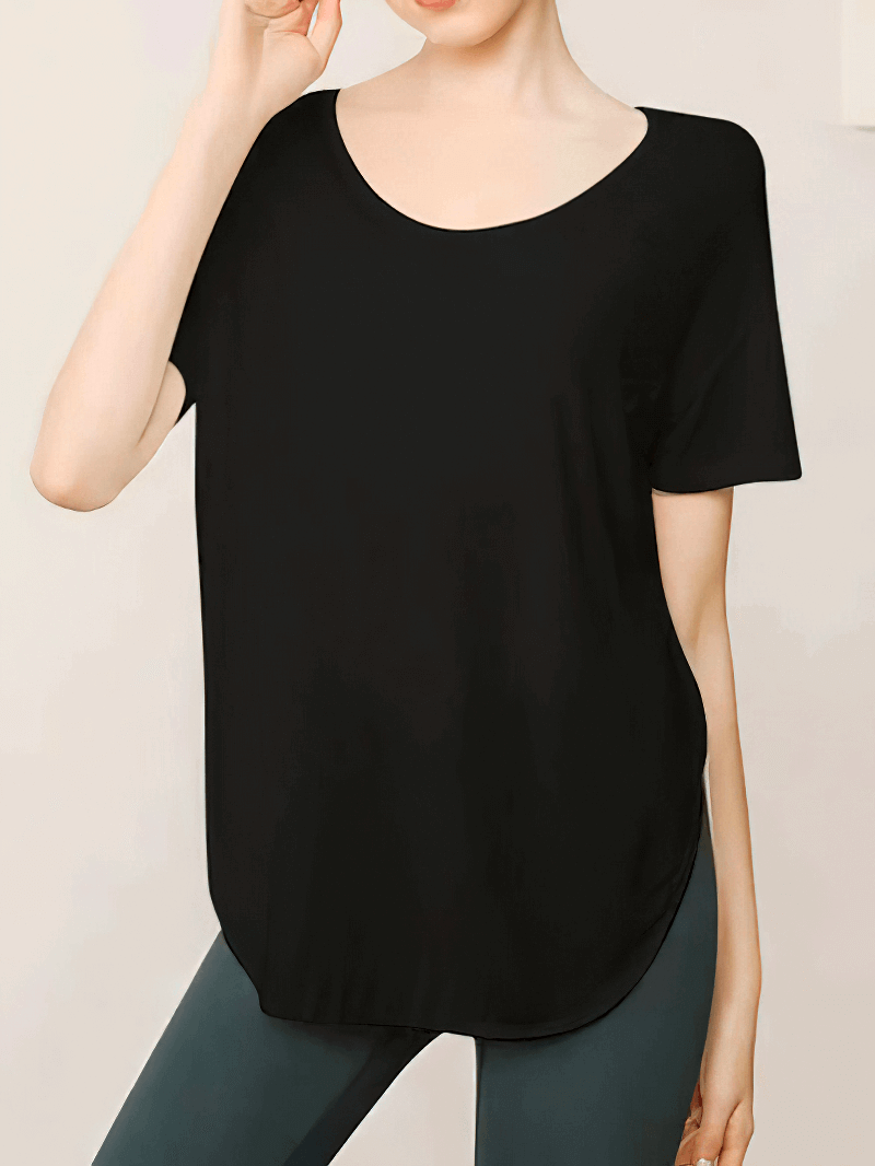 Loose round neck solid color black t-shirt for women, ideal for yoga workouts, made with breathable quick-drying Spandex fabric.