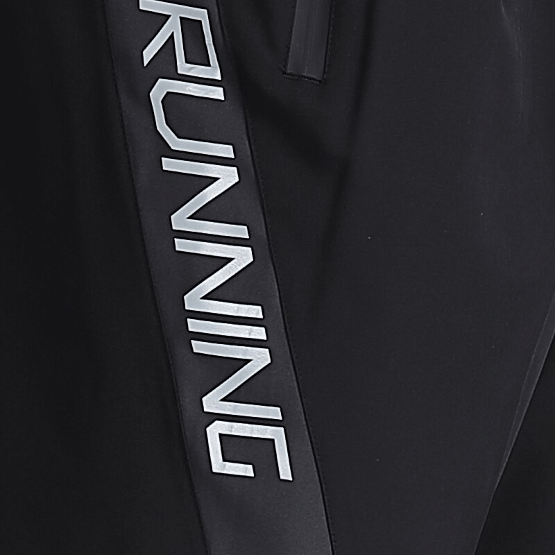 Close-up of black men's sports shorts with 'RUNNING' text, featuring lightweight, quick-dry fabric and stylish design.