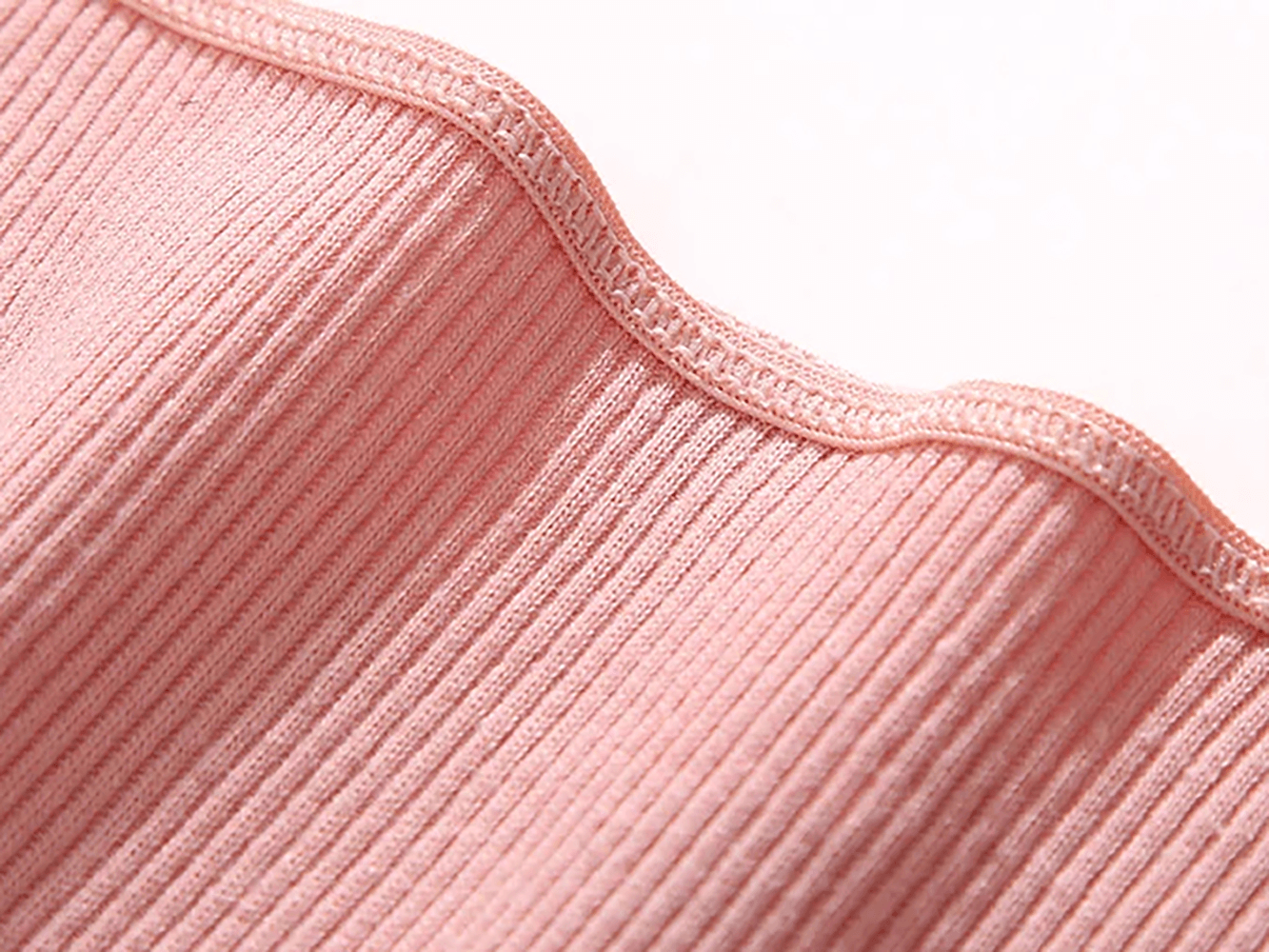 Close-up of Low Waist Ribbed Cotton Thong Panties for Women - SF4631 showing ribbed texture in soft pink.