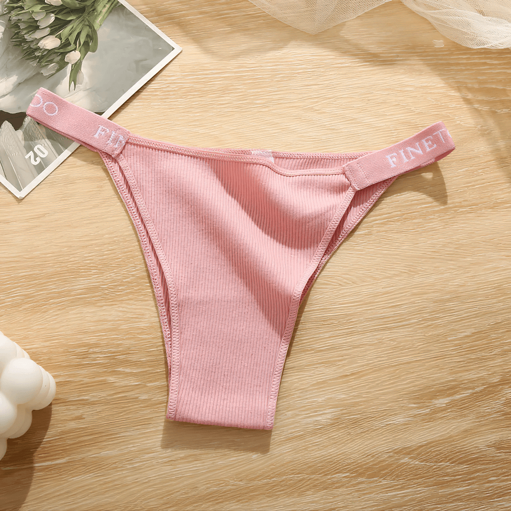 Low Waist Ribbed Cotton Thong Panties for Women - SF4631 in soft pink color with ribbed texture and elastic waistband.