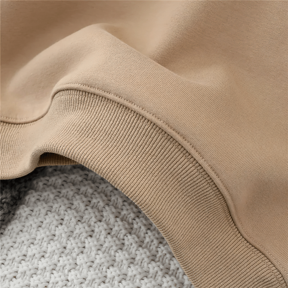 Close-up of Lucky Goldstar hoodie with soft beige plush lining, showcasing cozy fabric texture and fine stitching details.