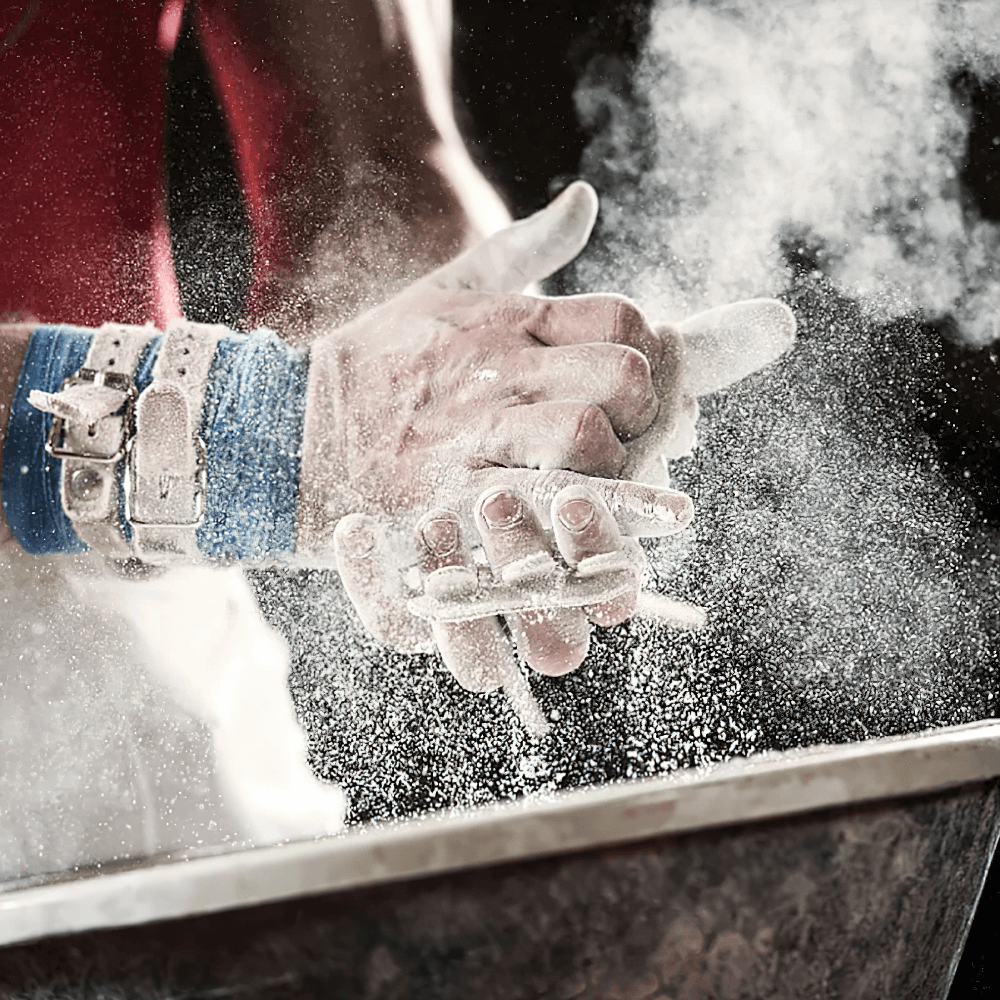 Athlete using Magnesium Chalk Ball for Weightlifting and Climbing - SF3452 to prep hands for lifting, enhancing grip and performance.