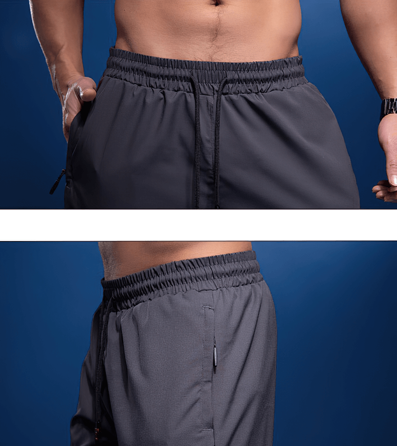 Male elastic waist sports joggers with zipper pockets, perfect for running and active lifestyles. Sporty athletic wear for men, SF1421.