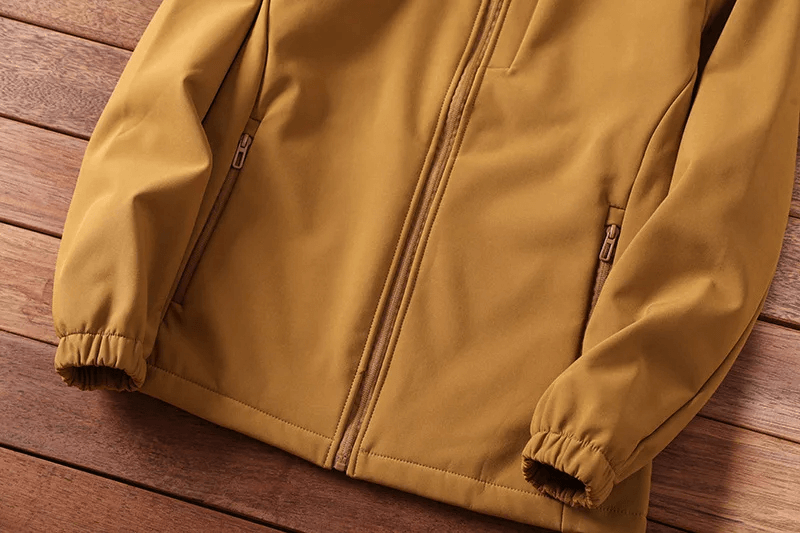 Durable waterproof hiking jacket for men, ideal for camping adventures with windproof and thermal features. Stylish and rugged design.