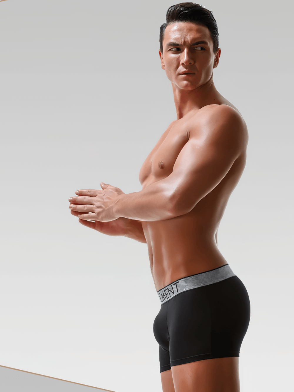 Male U-Convex Pouch Boxer Briefs with Waistband - SF4708 displayed on a model in a side view, showcasing athletic fit and style.