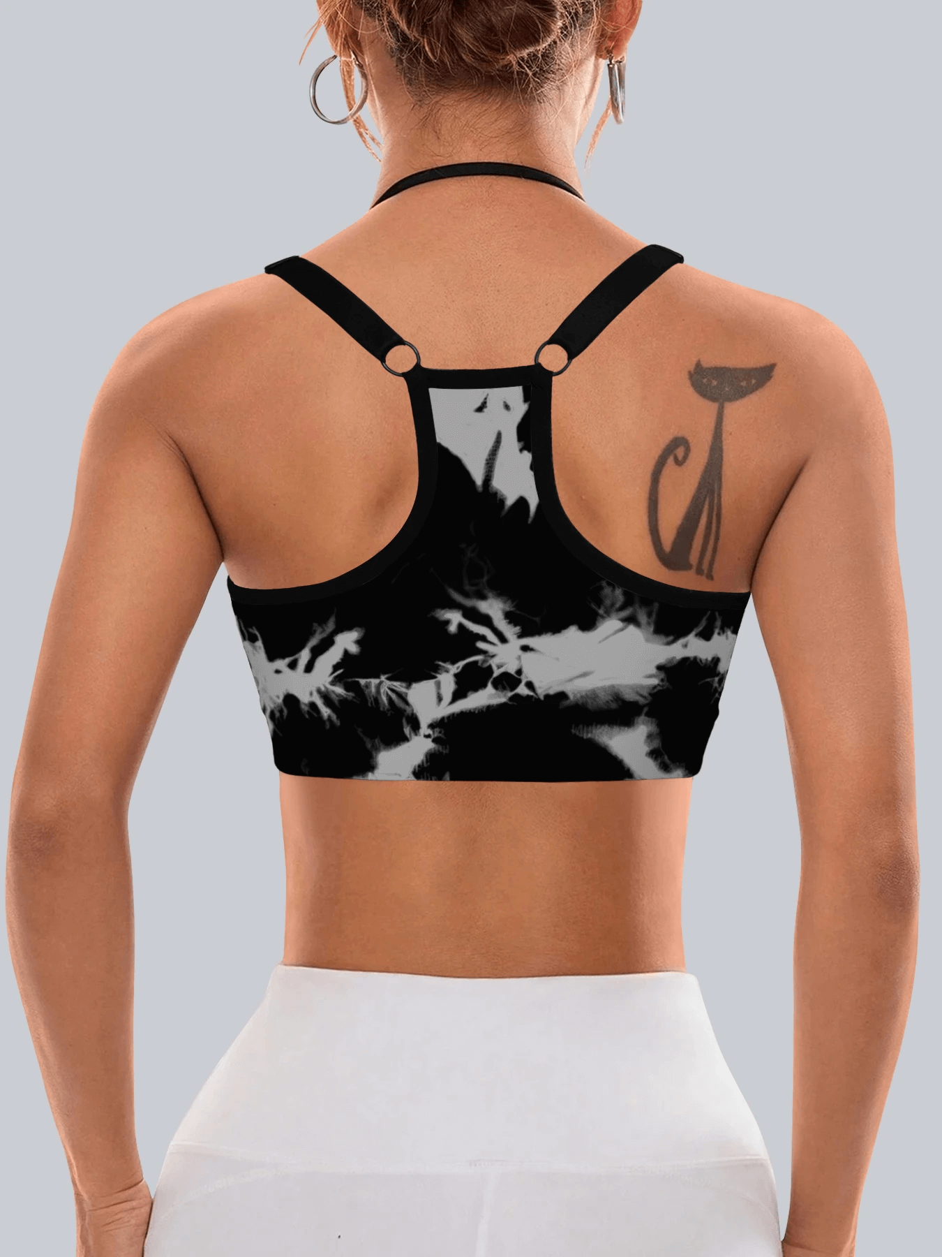 Back view of Marble Print Racerback Sports Bra with Pads - SF4070 in black, showcasing breathable mesh lining and racerback design.