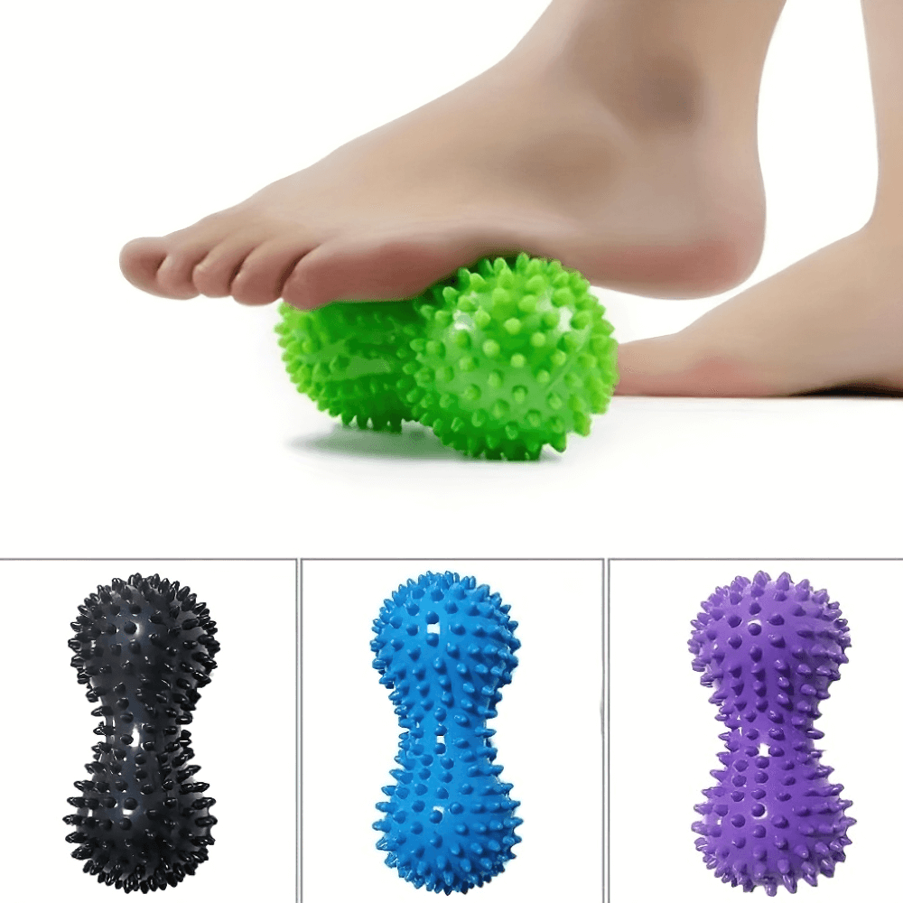 Foot massage with green peanut-shaped spiky therapy ball for deep tissue relief; shown in black, blue, and purple variations.