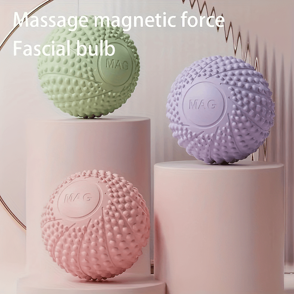 Textured massage balls for deep tissue therapy and muscle tension relief, in three colors: green, purple, and pink, on blocks.