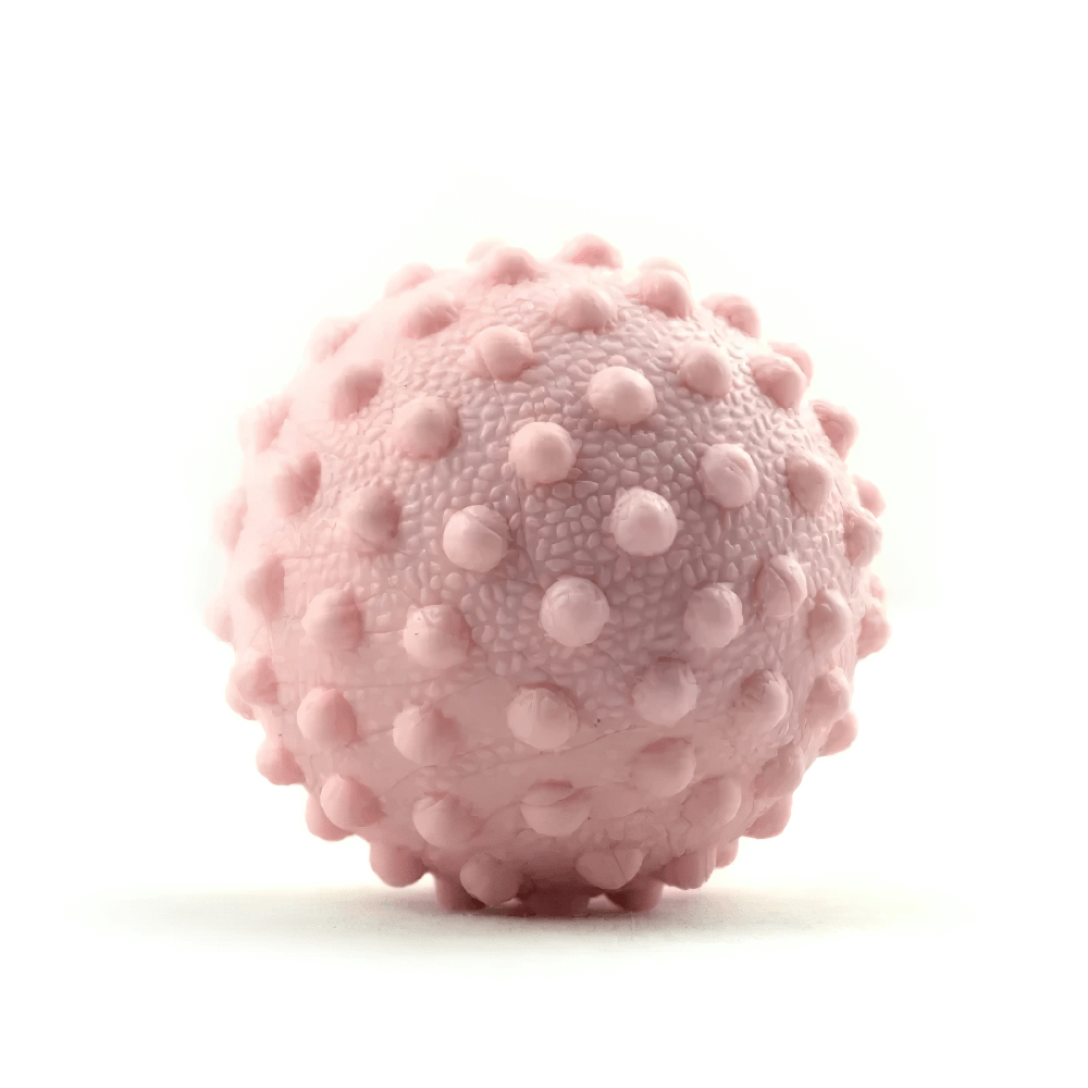 Pink spiky TPE massage ball for deep muscle relaxation and trigger point therapy, ideal for sports recovery and pain relief.