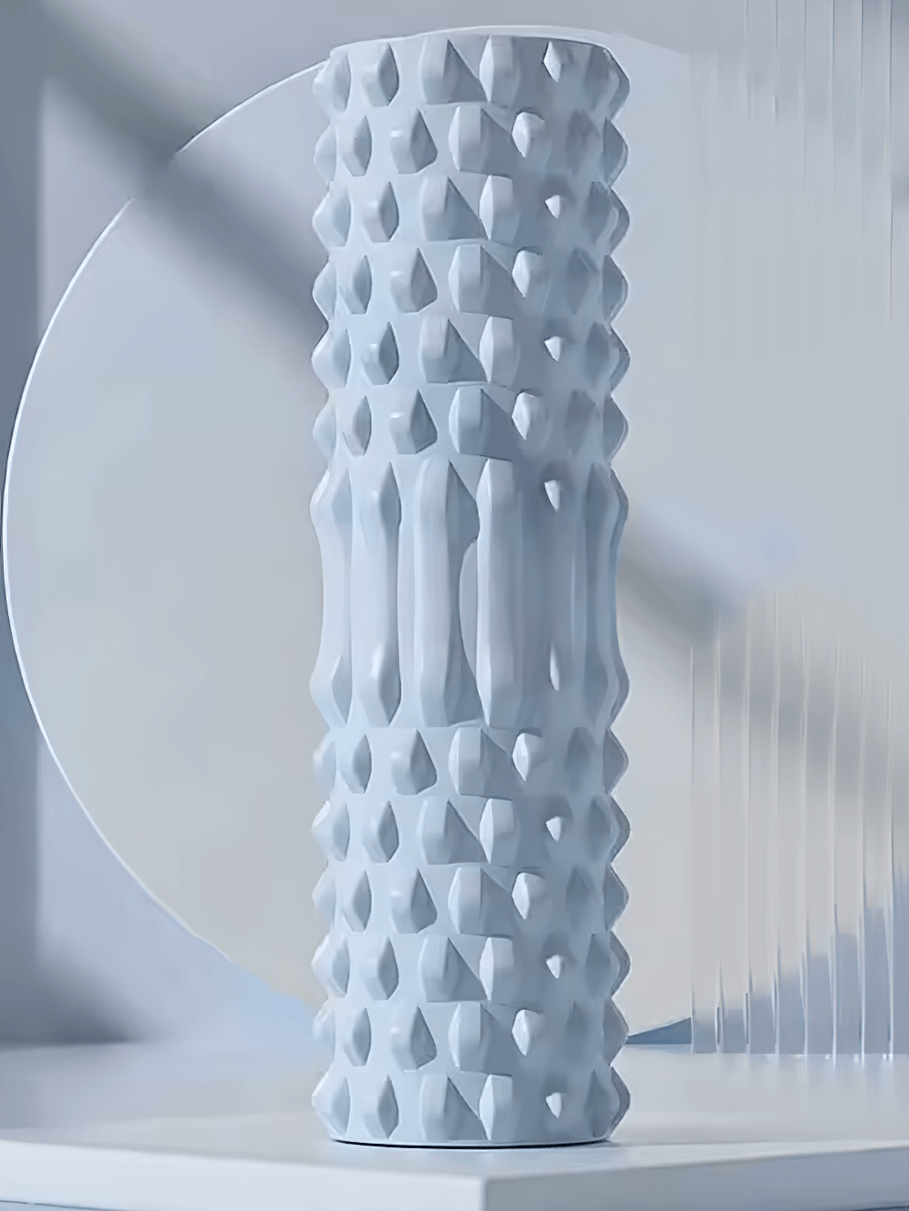 Eva foam massage roller for muscle relief and flexibility with textured surface for deep tissue massage.