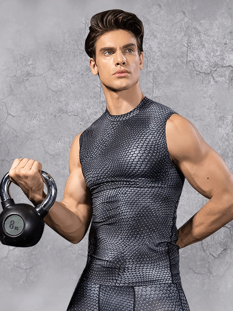 Men's quick-dry athletic tank top in gray, worn by a model holding a kettlebell, showcasing its compression fit and breathability for workouts.