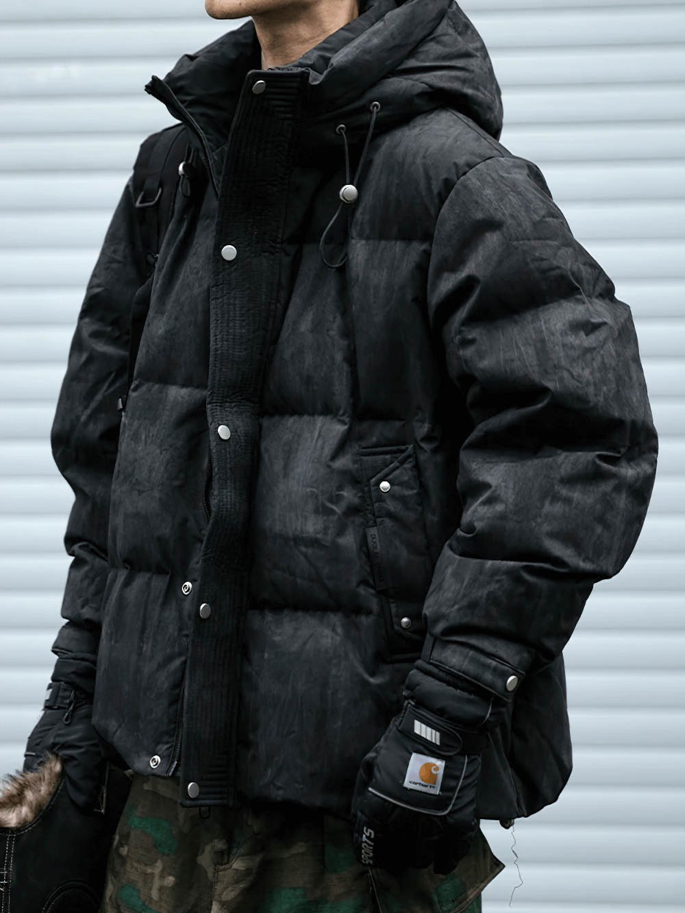 Men's black hooded duck down puffer jacket, streetwear style, with zip closure, broadcloth fabric, perfect for winter fashion.