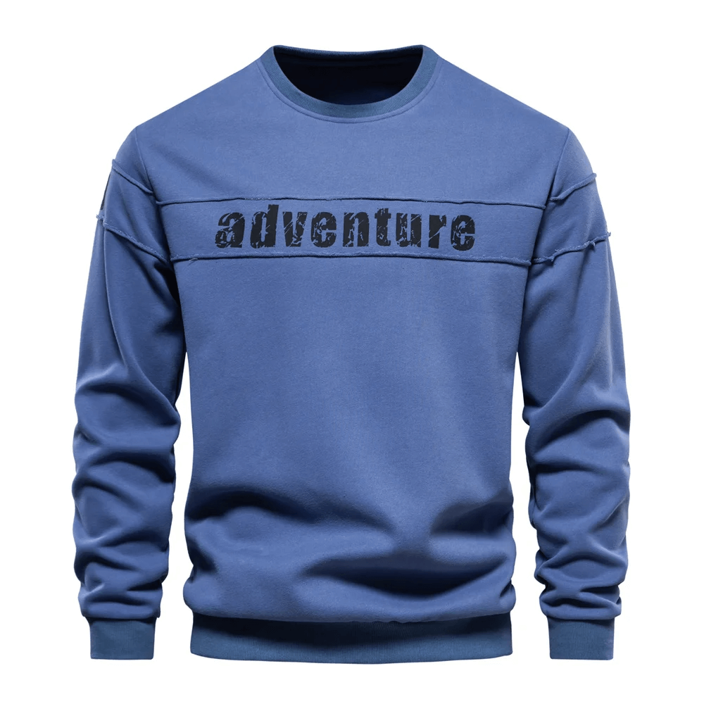 Men's blue patchwork adventure print crewneck sweatshirt, trendy casual wear with sporty O-neck design, perfect for everyday style.