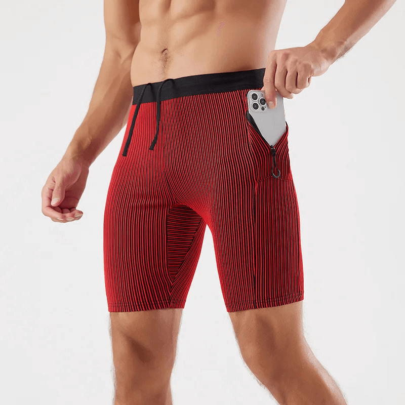 Men's quick-dry red striped swim trunks with pocket for phone, showcasing sleek design and functionality.