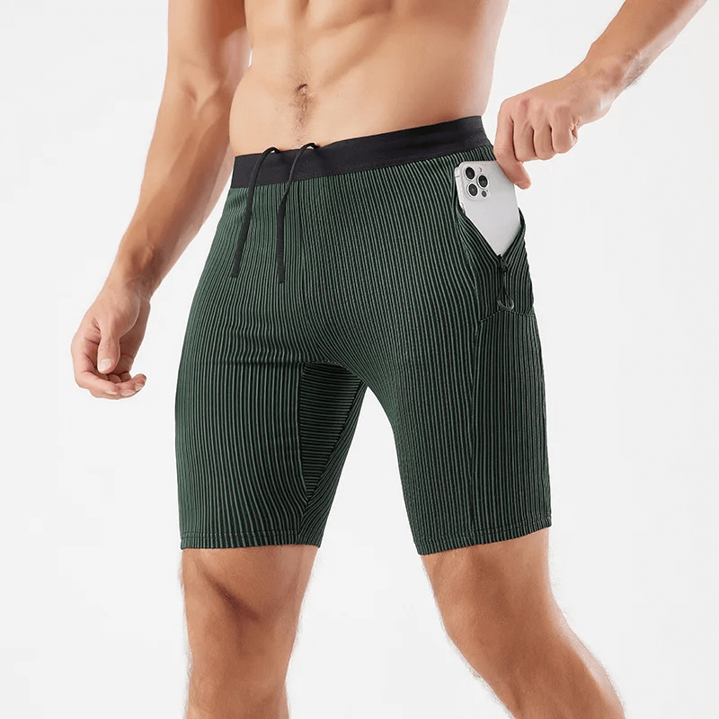 Men’s quick-dry striped swim trunks with pocket, perfect for swimming and storing essentials, shown in sleek design.