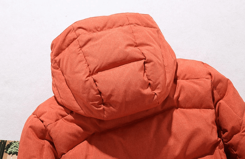 Close-up of an orange hooded jacket from the Men's Windproof Ski Suit - SF2045, showcasing its padded windproof design.