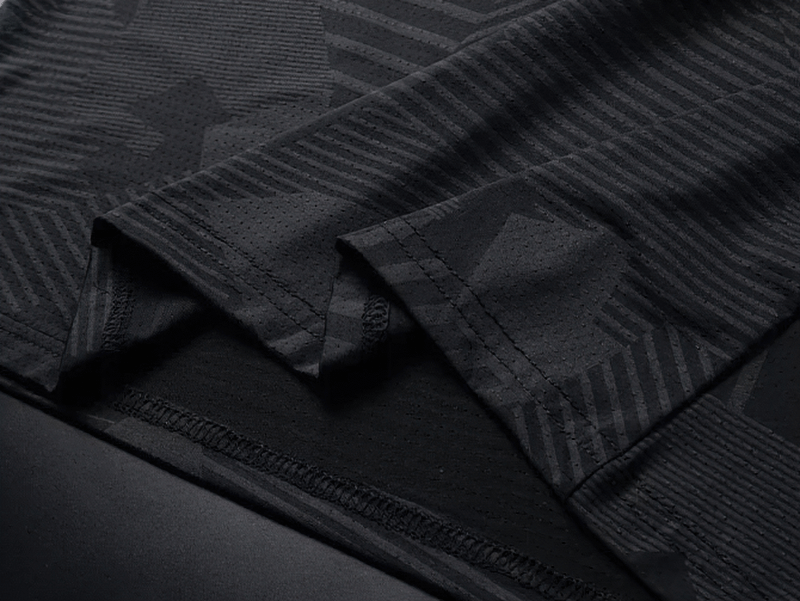 Close-up of the Men's Active Dry-Fit Crew Neck Patterned T-Shirt in black, showcasing detailed fabric texture and stitching. SF1986