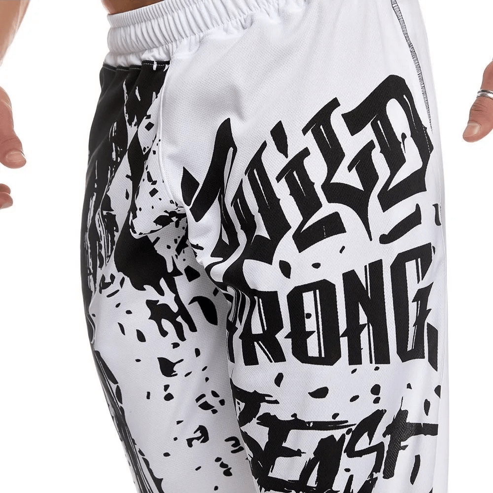 Men's athletic drip print sweatpants with black graffiti design, perfect for gym and running, featuring strong and bold style.