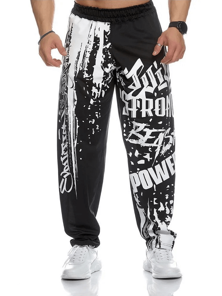 Men's drip print athletic sweatpants with bold design for gym and running, featuring polyester fabric and drawstring fit, SF1953.