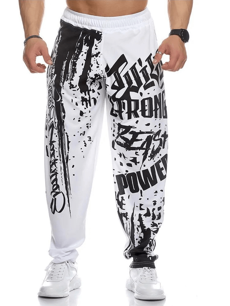 Men's athletic drip print sweatpants with graffiti design, perfect for gym workouts. Polyester fabric with drawstring closure. SF1953