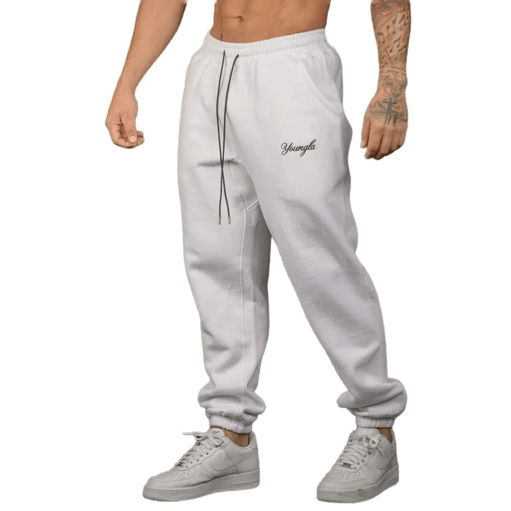 Men's athletic fit joggers - durable white sweatpants with bold lettering, perfect for stylish comfort and versatility.