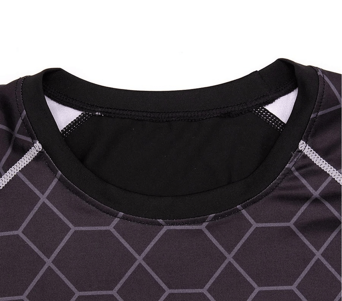Close-up of men's athletic long sleeve sports top SF2223 in black with hexagonal pattern, designed for performance and comfort.