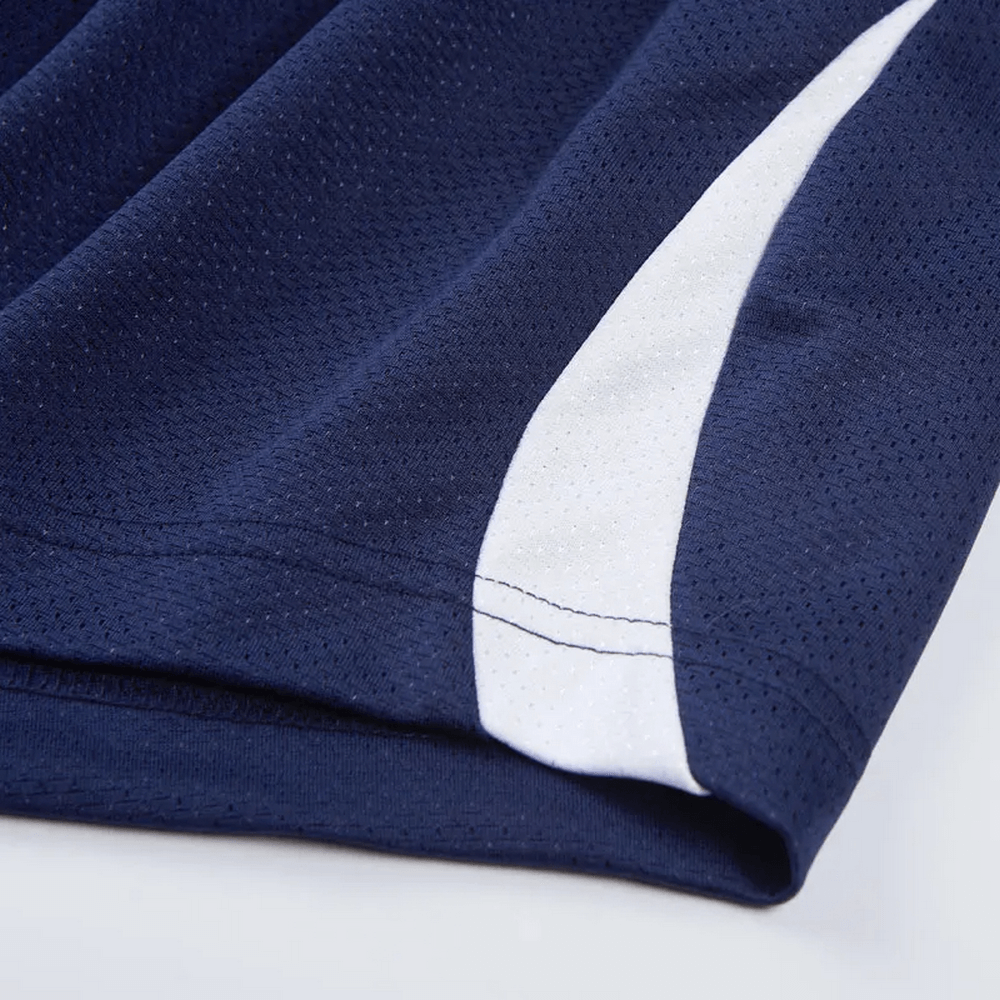 Close-up of navy blue athletic mesh tank top with white stripe, showcasing breathable and quick-drying fabric for men's sportswear.