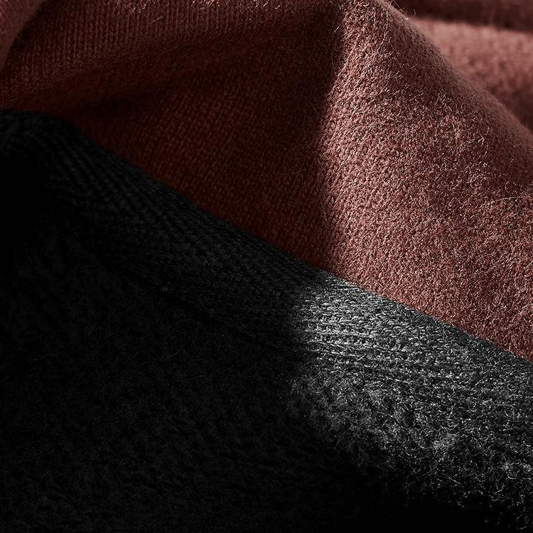 Close-up of soft cotton fabric in brown and black for Men's Autumn/Winter Cotton Turtleneck Sweatshirt, showing texture and quality.