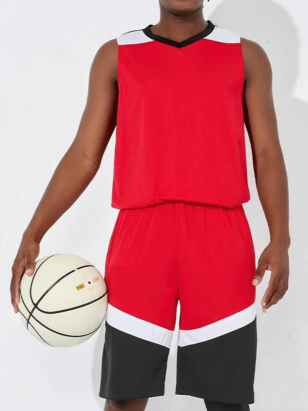 Men's Basketball Jersey and Shorts Training Set - SF4557 in bold red with black and white contrast, held by a player with a basketball.