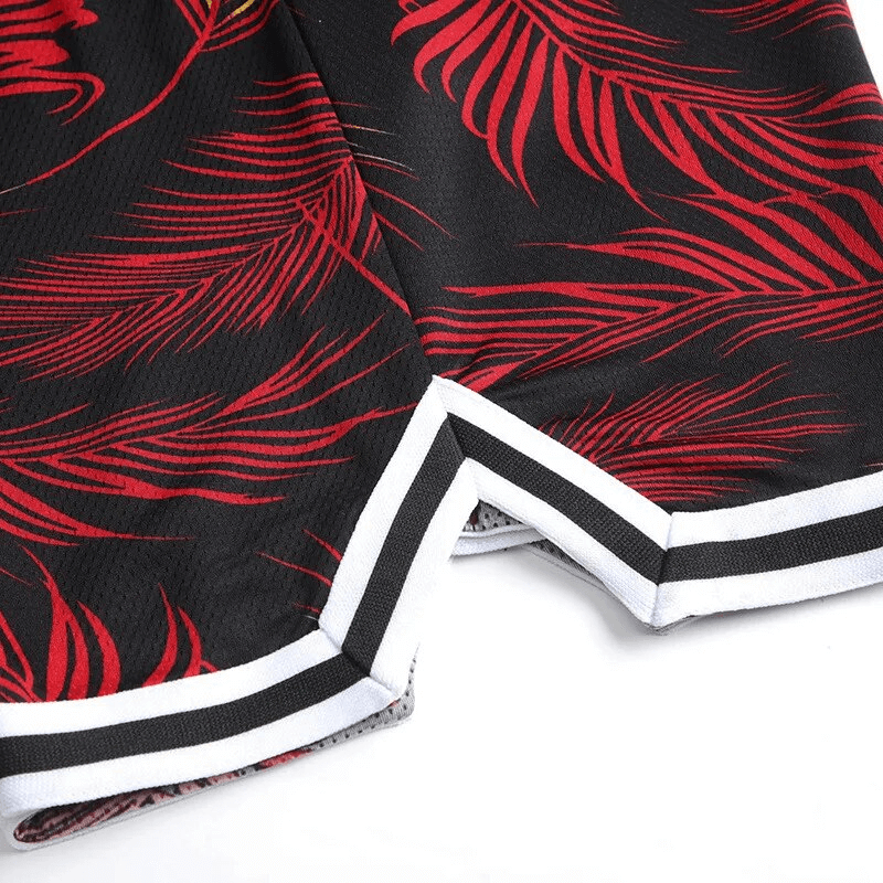 Close-up of Men's Basketball Sports Elastic Waist Board Shorts with red print, lightweight and breathable for active performance.
