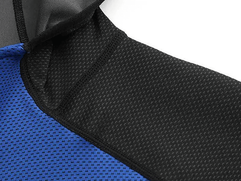 Close-up of black and blue breathable fabric on men's hooded running jacket.