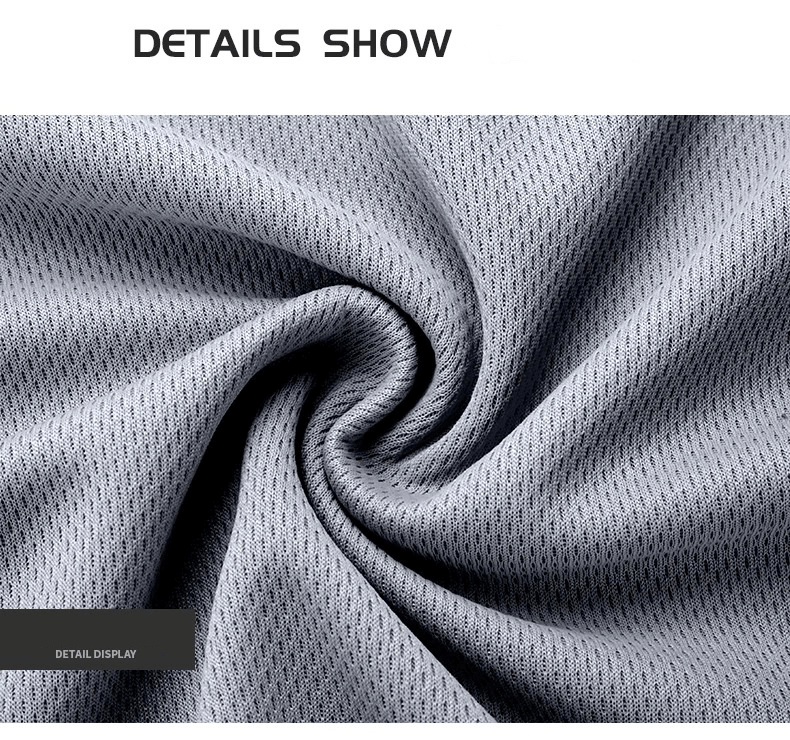 Close-up of breathable grey sports fabric detail for SF2027 Men's Fitness Tee and Shorts, highlighting texture and quality.