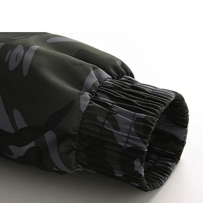 Close-up of a men's camo print waterproof tactical jacket sleeve