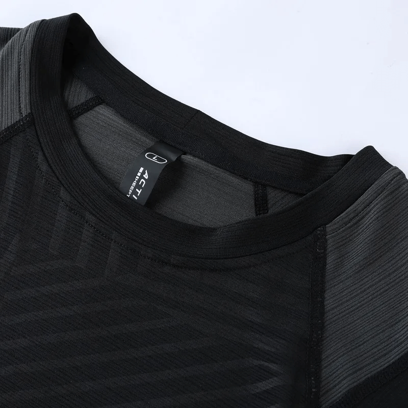 Men's Casual Sports Long Sleeve Top SF1556 in black, made of breathable polyester for comfort during workouts and physical activities.