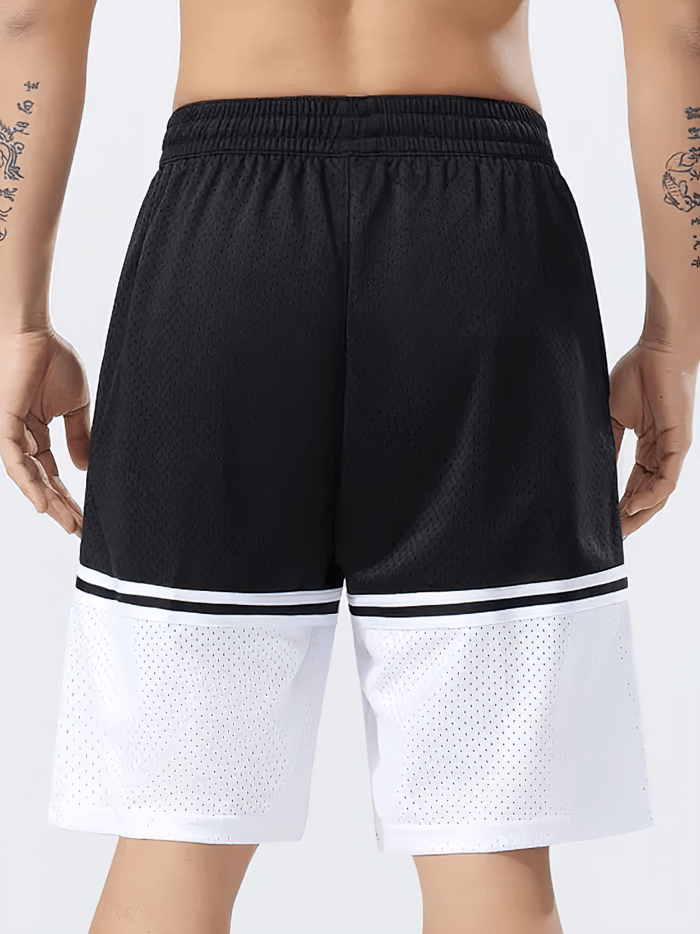 Men's Color Block Mesh Basketball Training Shorts - SF4573 showcased from the back, featuring a stylish black and white color scheme.